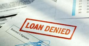 loan-denied-stamp-over-borrowers-signature_573x300